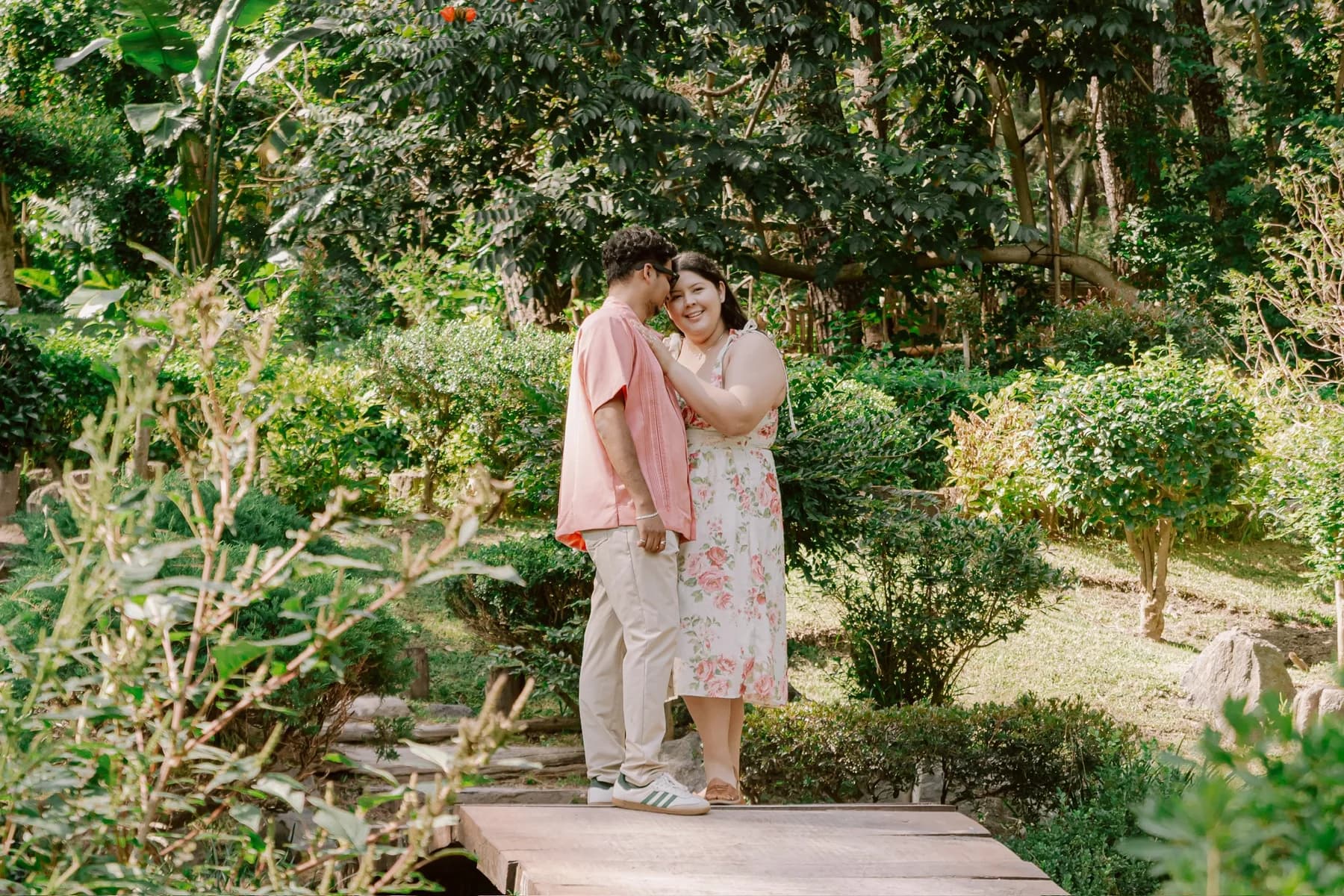 Nathan and Natalia sharing a moment on the garden bridge