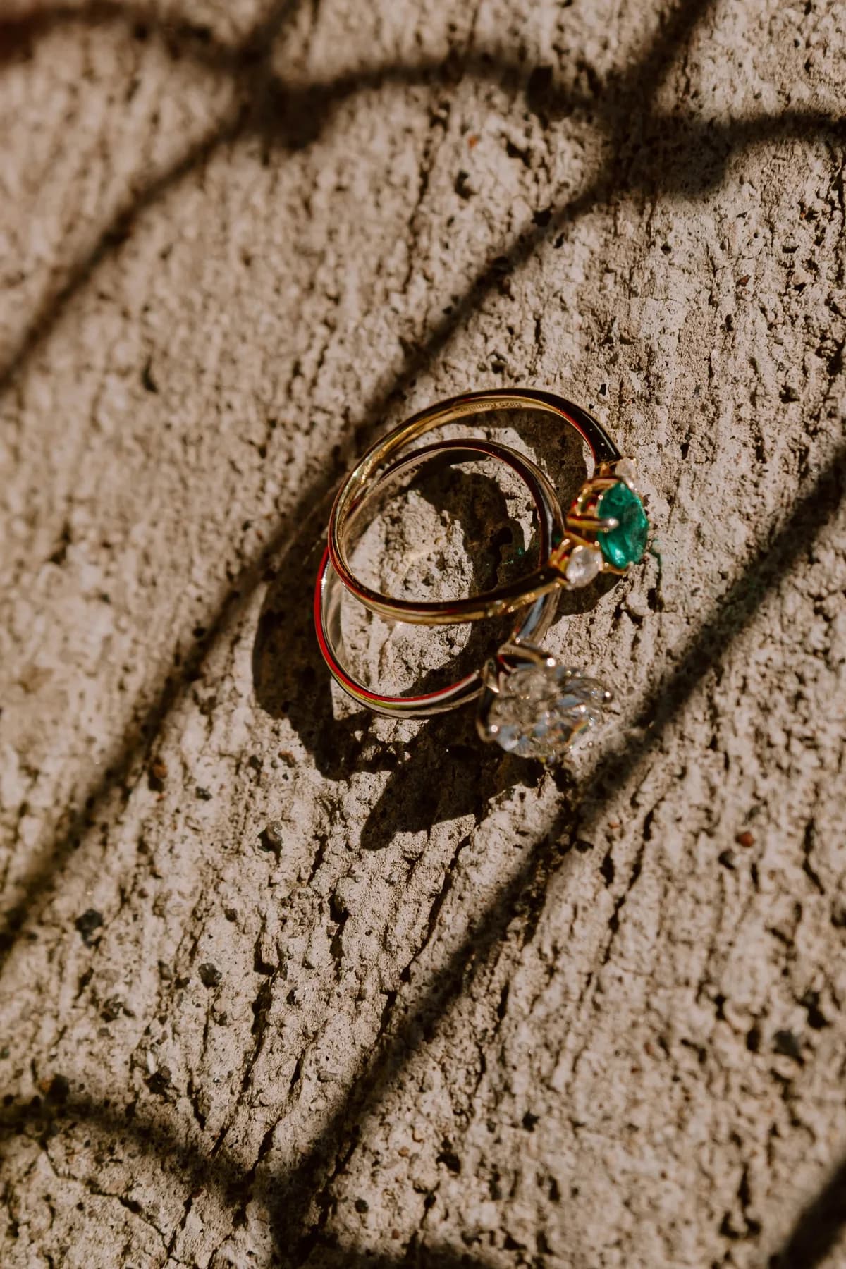 Our rings together, catching the garden sunlight
