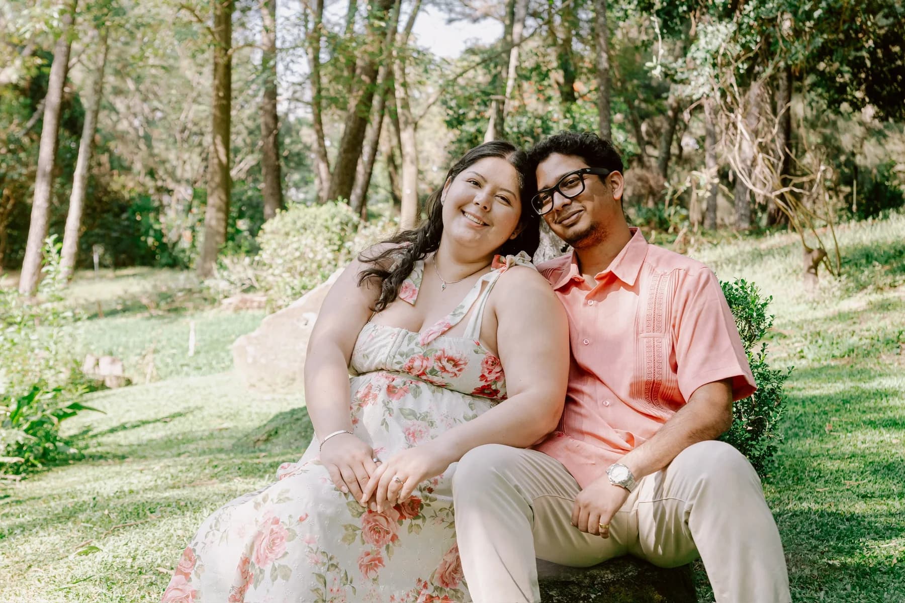Nathan and Natalia sitting together in the gardens